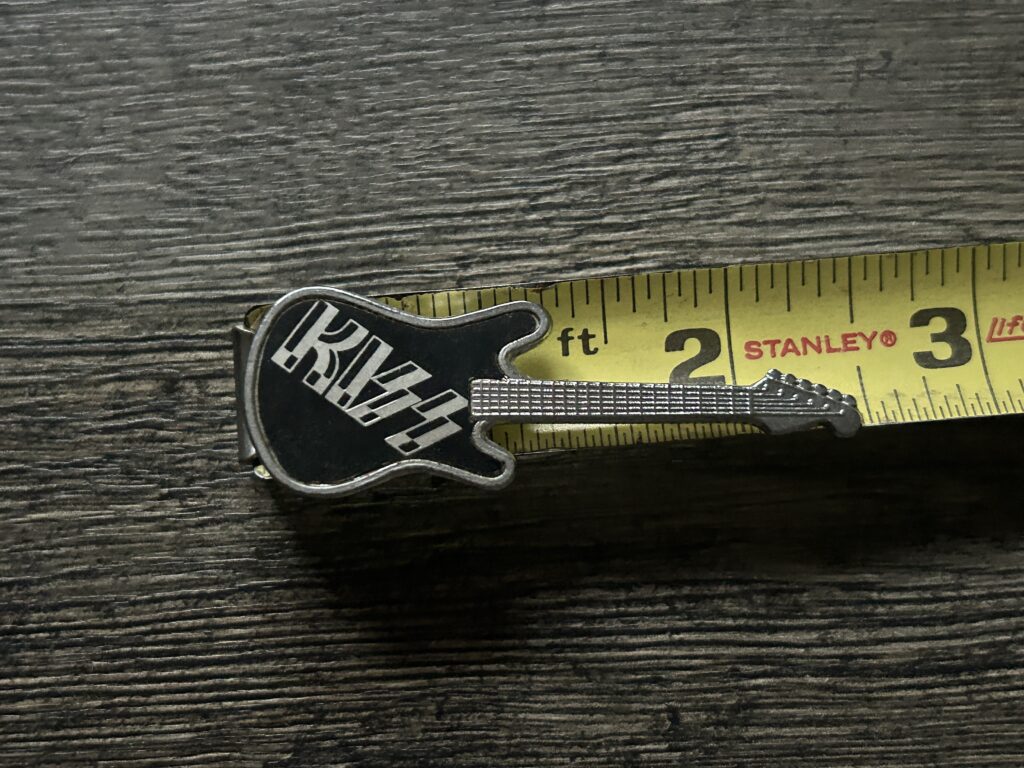 KISS Pin Badge Black Guitar Silver Logo 2 1/2" Vintage Kiss Memorabilia Aucoin