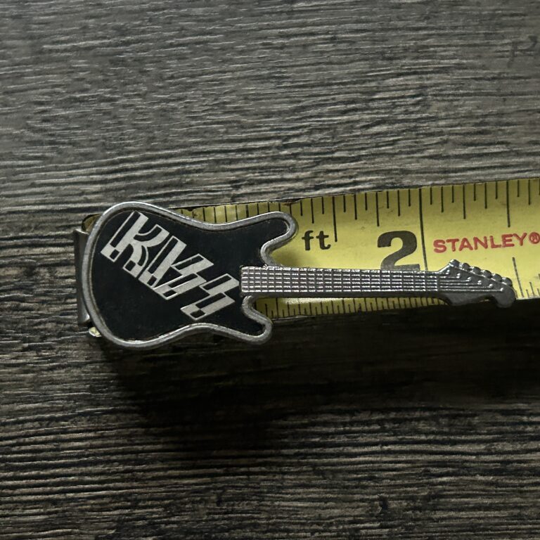KISS Pin Badge Black Guitar Silver Logo 2 1/2" Vintage Kiss Memorabilia Aucoin